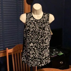 Sleeveless blouse designed with beads
